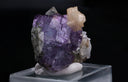 Unique Purple Fluoride with Calcite Flower (UV Red Light)